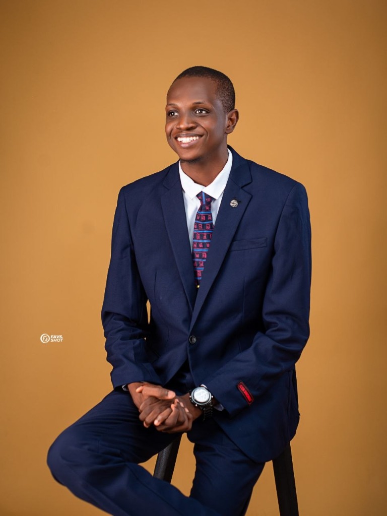 Seated portrait in navy suit