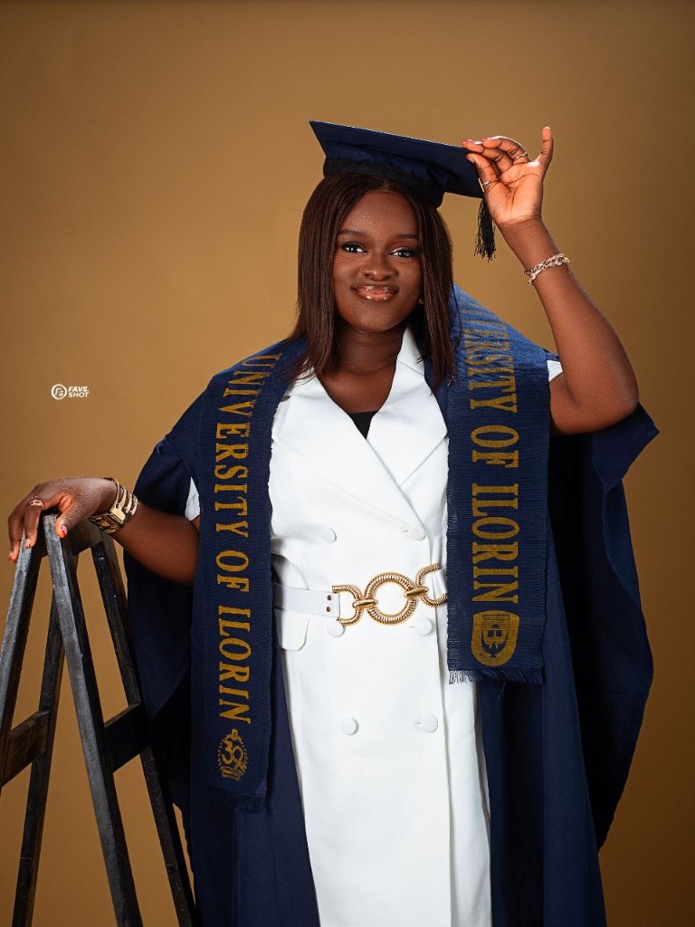 University graduate portrait with sash