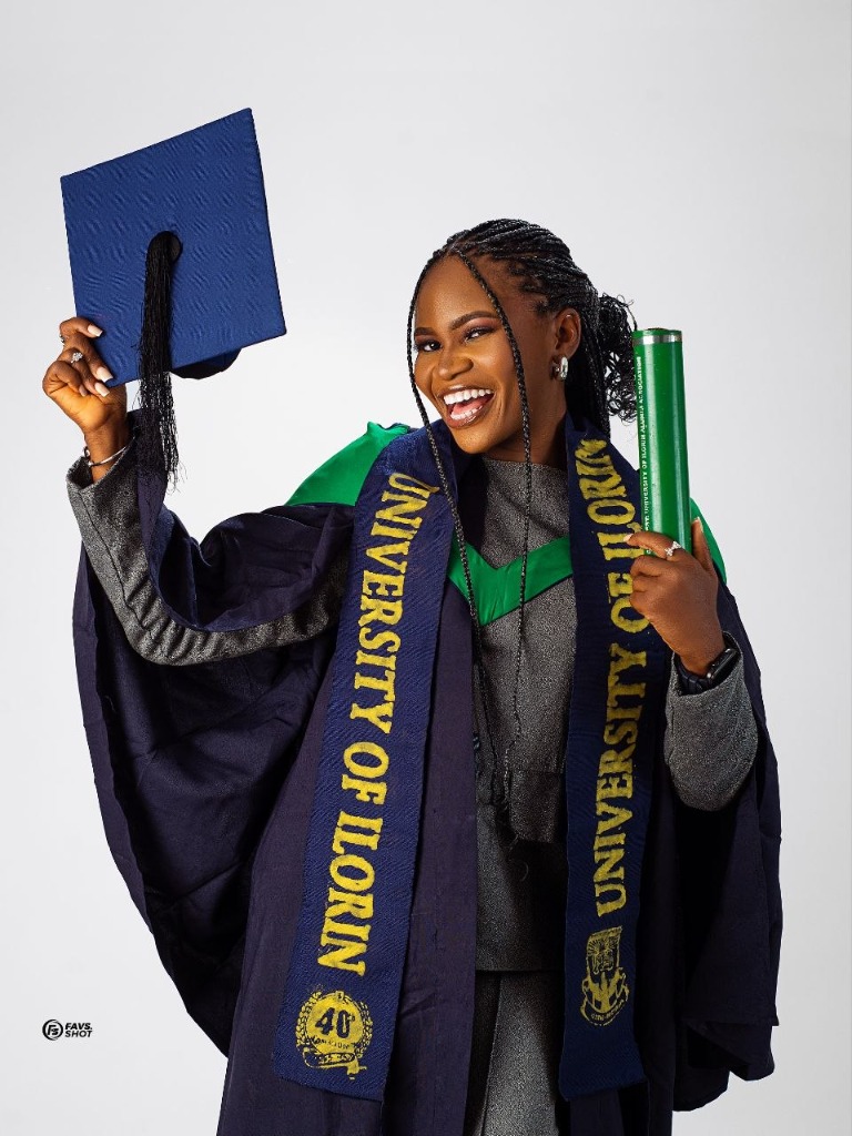 Celebratory graduation portrait with cap