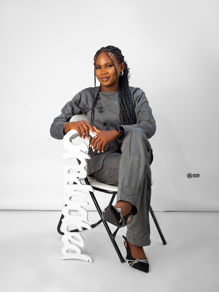Graduate portrait with seated prop